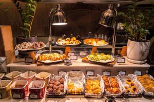 a buffet with many different types of food on display at Banyan Tree Bangkok in Bangkok +87 photos