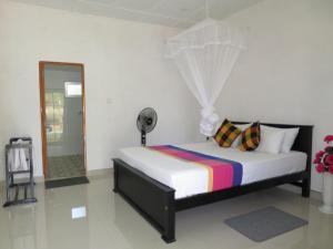 Postel nebo postele na pokoji v ubytování Sigiriya Amenity Home Stay