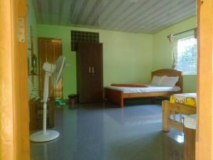 Voodi või voodid majutusasutuse HIDEEN VALLERY RIVERSIDE HOMESTAY A Unit Of EPIC Holidays toas +16 fotot