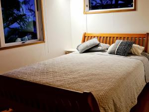 Postel nebo postele na pokoji v ubytování Blue Horizon Hideaway