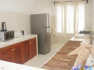 Kuchyň nebo kuchyňský kout v ubytování Ocean Views, Steps to the Shore