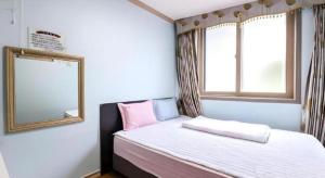 Ένα ή περισσότερα κρεβάτια σε δωμάτιο στο Ace Hotel +76 φωτογραφίες