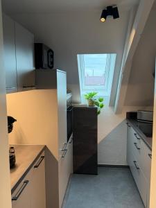 Η κουζίνα ή μικρή κουζίνα στο Über den Dächern von Bielefeld schlafen! +3 φωτογραφίες