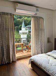 Φωτογραφία από το άλμπουμ του Hotel Woodland στο Αϊζάουλ