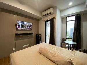 En eller flere senge i et værelse på Apartement Delf Unit 736 By Millpro + 2 billeder