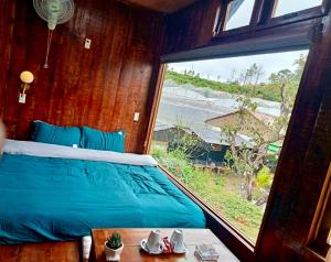 Ένα ή περισσότερα κρεβάτια σε δωμάτιο στο Thanh Xuân Hồ Homstay