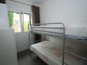Posteľ alebo postele v izbe v ubytovaní Holiday Home in Calonge near Beach