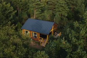 an overhead view of a cabin in the woods at Getlost cabins in Valanciunai