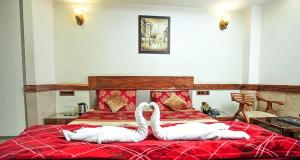 Ένα ή περισσότερα κρεβάτια σε δωμάτιο στο Hotelheaven