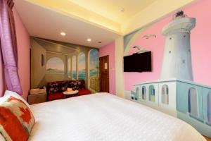 Postelja oz. postelje v sobi nastanitve Love in Hengchun B&B