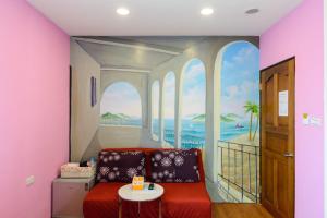 Predel za sedenje v nastanitvi Love in Hengchun B&B