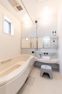 Koupelna v ubytování Jin's Place - 15m to Haneda & Shinagawa