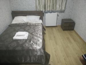 Rúm í herbergi á Hotel Mimino