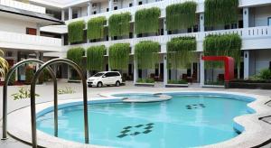 Πισίνα στο ή κοντά στο Grand Mutiara Hotel