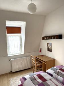 Krevet ili kreveti u jedinici u okviru objekta Apartment im Hinterhaus