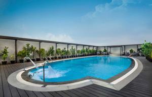 Bazén v ubytování The Residency Towers nebo v jeho okolí