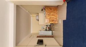 a small kitchen with a sink and a counter at SPOT ON 1021 Dai Thang Motel in Da Nang