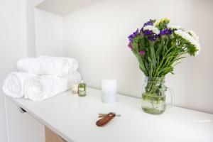 Posteľ alebo postele v izbe v ubytovaní Bridge Apartments + 28 fotografií
