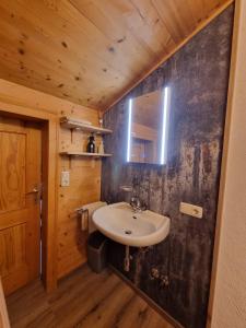 Ένα μπάνιο στο Ferienwohnung Weber