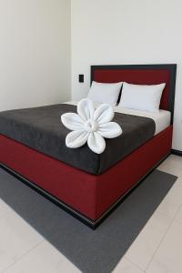 Postel nebo postele na pokoji v ubytování Ravan Pine Nature Retreat