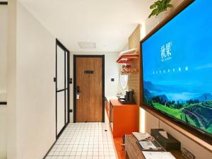 Photo de la galerie de l'établissement QiuGuo Hotel Chao He Beijing Dashilan Xijie Qianmen Subway Station Branch, à Pékin