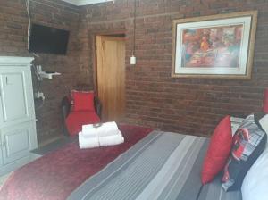 Μια τηλεόραση ή/και κέντρο ψυχαγωγίας στο Sundown Lodge and Confrence