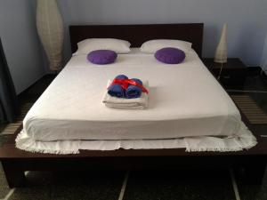 A bed or beds in a room at Il Riposo del Guerriero Guesthouse