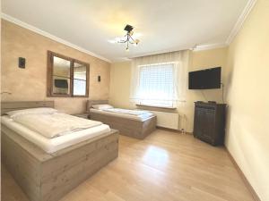 Postel nebo postele na pokoji v ubytování Haus Lindenstraße Lindenstraße 24