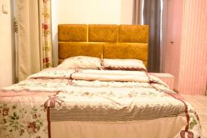 Postel nebo postele na pokoji v ubytování ftrealtyproperties Tango Suites 3