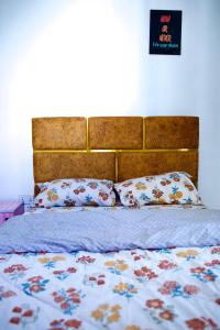 Postel nebo postele na pokoji v ubytování ftrealtyproperties Tango Suites 3