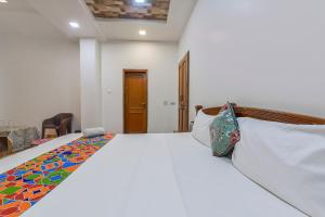 Postel nebo postele na pokoji v ubytování Hotel Pink Cozzy