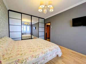 Postel nebo postele na pokoji v ubytování Чудові апартаменти!!!