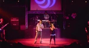 a man and a woman standing on a stage at Vasu Hotel Mahasarakham in Maha Sarakham
