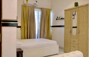 Ένα ή περισσότερα κρεβάτια σε δωμάτιο στο Ft realty properties 5 +11 φωτογραφίες