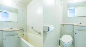 ein weißes Badezimmer mit Toilette und Waschbecken in der Unterkunft Tabist Joetsu Central Hotel Takada Nakamachi in Honchō + 65 Fotos