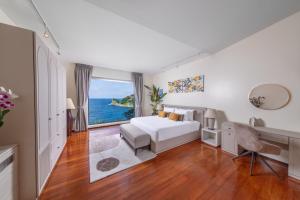 Postel nebo postele na pokoji v ubytování Villa Viman + 35 fotografií