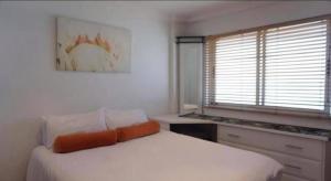 Ένα ή περισσότερα κρεβάτια σε δωμάτιο στο Step into the OCEAN +9 φωτογραφίες