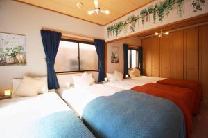 Fotografie z fotogalerie ubytování 20-minute train ride to Akihabara Direct bus to Disney Direct bus to Haneda Airport Private house 5-minute walk from Ichinoe station v Tokiu