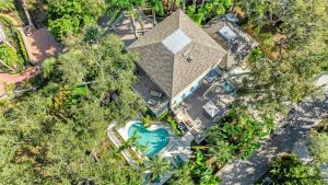 an overhead view of a house with a swimming pool at Hemingway House - 117 in Siesta Key