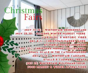 a wall with a christmas fair sign in a room at Seaside Stay High-speed Wi-fi in Zoutelande