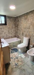 Koupelna v ubytování فيلا الدانة + 6 fotografií