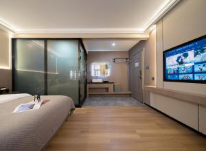 Μια τηλεόραση ή/και κέντρο ψυχαγωγίας στο Yiyun Residence