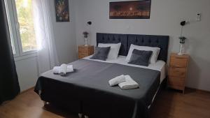 Ένα ή περισσότερα κρεβάτια σε δωμάτιο στο XANTHI COUNTRY LAND apartment