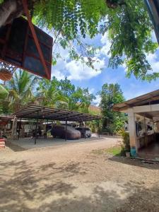 a basketball hoop in front of a building at correashomestay in Coron