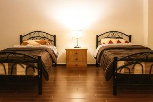 Postel nebo postele na pokoji v ubytování EMILE ALTWAL Hotel