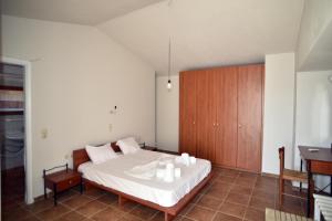 Postel nebo postele na pokoji v ubytování Βεατρικη Beatrice