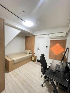 Χώρος καθιστικού στο Utama Hotel