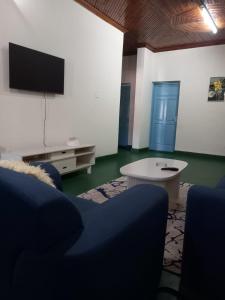 TV a/nebo společenská místnost v ubytování faith apartments + 6 fotografií