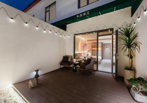 Χώρος καθιστικού στο 安渡酒店-苏州观前街七里山塘店