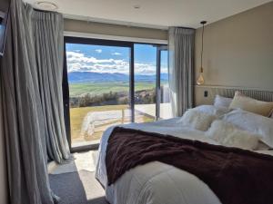 Postel nebo postele na pokoji v ubytování Bendigo Ridge - Where Activity is Relaxing